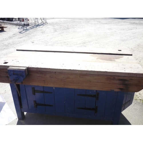 129 - Large wood working bench with vice