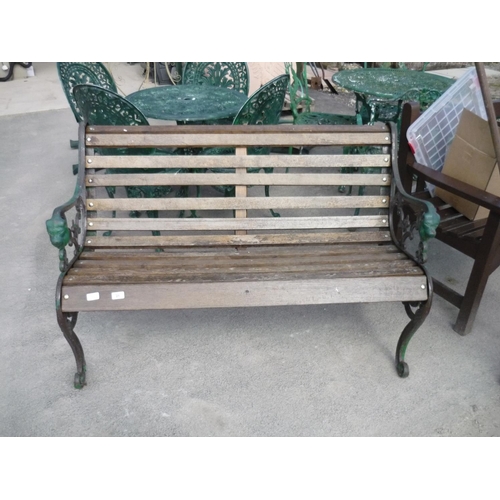 21 - Garden bench with green wrought iron ends