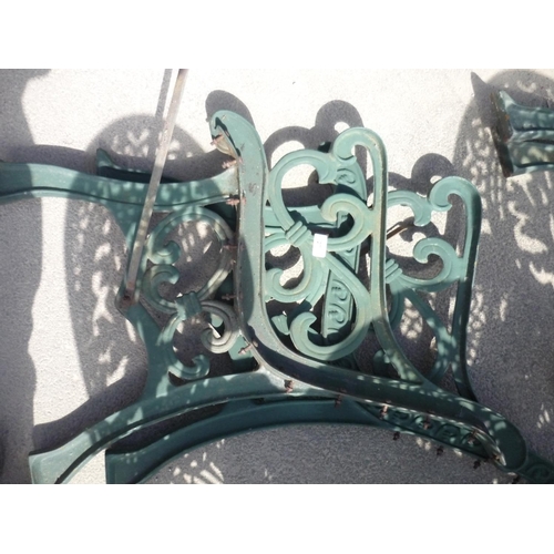 27 - Two wrought iron bench ends