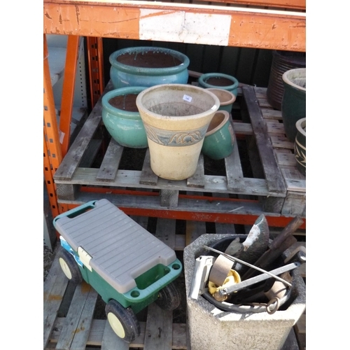 145 - Selection of garden plants pots and troughs, a stone trough and a bucket full of tools
