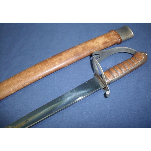 33 - Mid to late 20th C Indian sword with 30 inch slightly curved single fullered blade with various stam... 