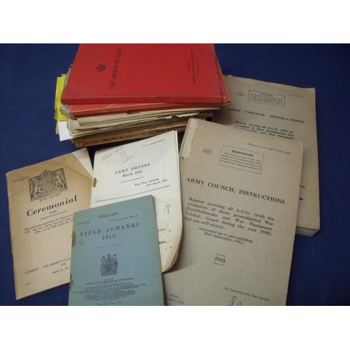 60 - Box containing a large selection of military ephemera, booklets and pamphlets including Field Almana... 
