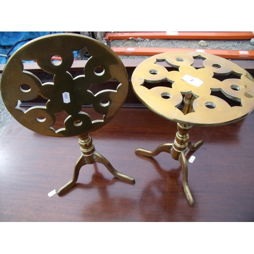 2 - Pair of 19th/20th C brass tilt top trivet stands in the form of tripod tables with circular tops, tu... 