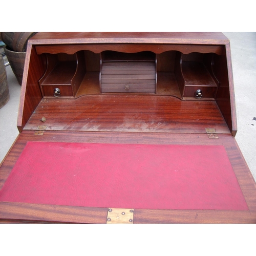 430 - Quality reproduction mahogany bureau with fall front revealing fitted interior above four drawers, o... 