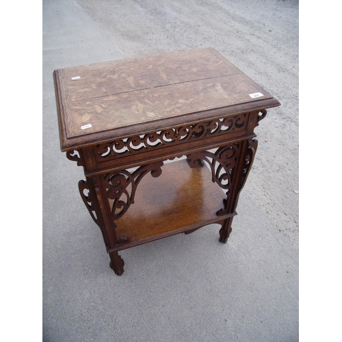 431 - Early 20th C oak two tier rectangular centre table with elaborate fretwork detail (58cm x 42cm x 72c... 