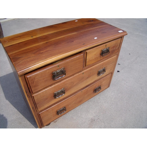 434 - Early 20th C lightwood chest of two short above two long drawers on bun feet (86cm x 45cm x 75cm)