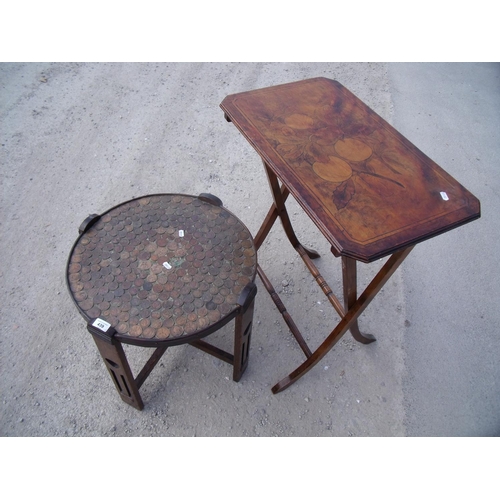 439 - 1930s oak circular table, the top inset with various copper coinage, and a folding inlaid table (2)