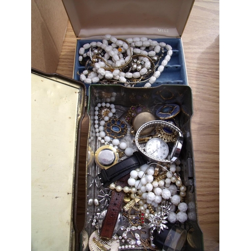 90 - Vintage tin containing a large selection of various assorted costume jewellery, watches, yellow meta... 