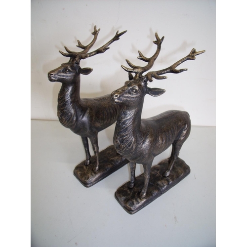 15 - Pair of bronze effect cast metal figures of stags on rectangular bases (height 30cm)