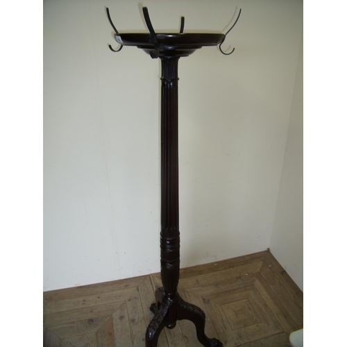 470 - Mahogany torcher hall stand with hat & coat racks and circular top, on fluted column with three lion... 