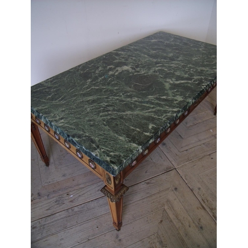 476 - Green marble top rectangular coffee table on Regency style base (70cm x 130cm x 55cm)