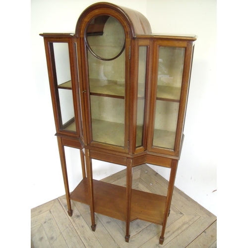 478 - Edwardian mahogany break front arch top display cabinet with upper glazed door above under tier, on ... 