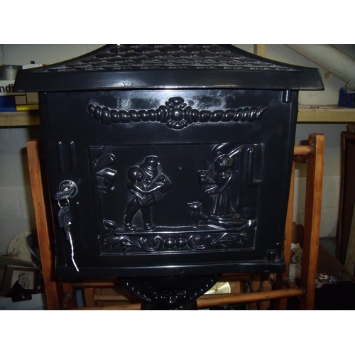 8 - Victorian style black finished modern metal letterbox on stand, with keys