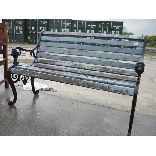 1 - Garden bench with wrought iron ends with lions on the handles