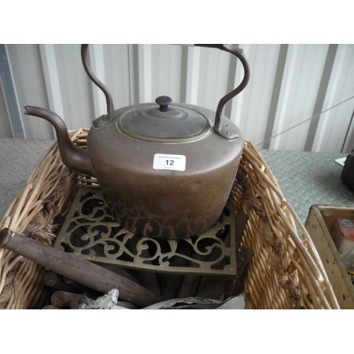 12 - Wicker basket containing a large amount of ladder runs, a bird box and a copper kettle with trivet