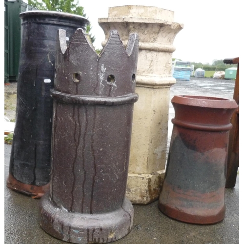 5 - Four chimney pots of various sizes and styles