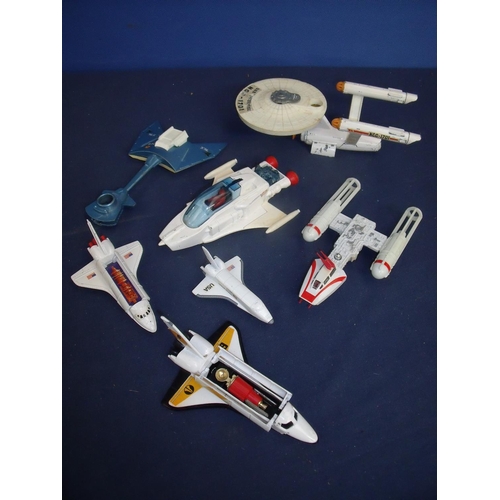 105 - Dinky USS Enterprise, a Kenner Y Wing Star Wars Bomber, various Matchbox, Corgi and other shuttles, ... 