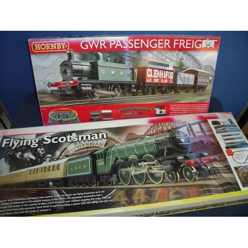 142 - Boxed Hornby OO gauge GWR Passenger Freight Set and a boxed Flying Scotsman Train Set (2)