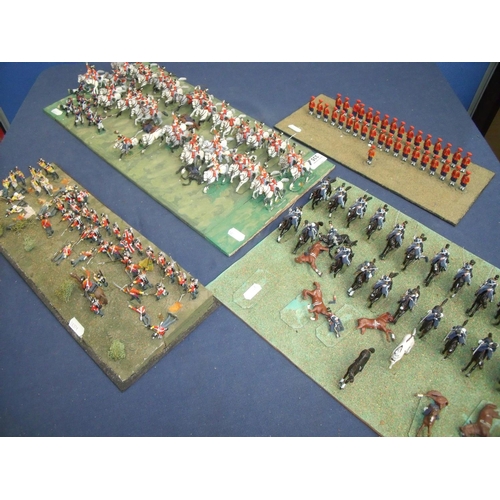 335 - Group of four cast metal military painted miniature Napoleonic war era layouts including British Cav... 