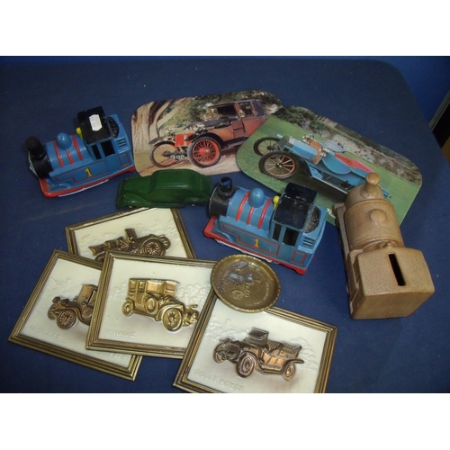 42 - Ceramic train moneybox, two Thomas the Tank Engine models, figure of a vintage car, Burrell Traction... 