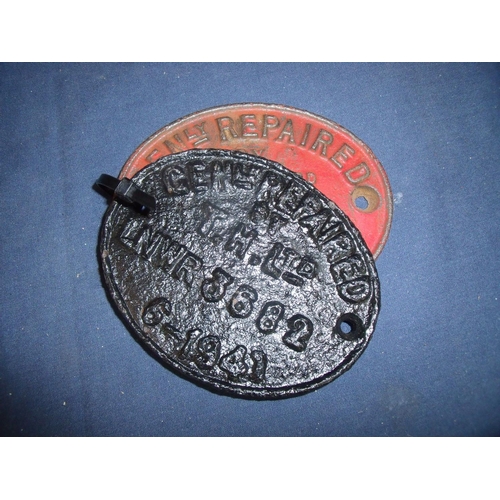 54 - Two cast metal oval carriage plates, one marked 1979 and the other 1941 (2)