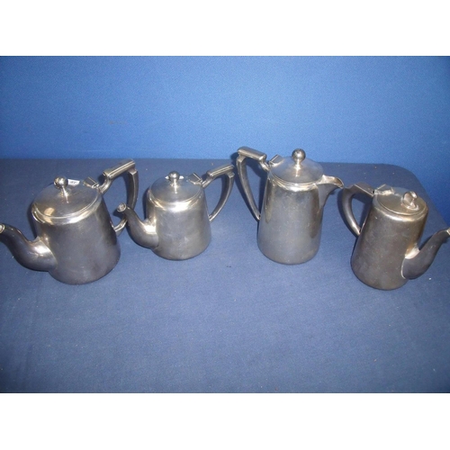 64 - Four British Railway coffee and tea pots, one marked Midland Hotel Leicester, the others by Mappin &... 