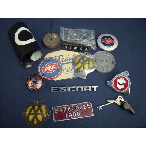 78 - An AA car badge, a Bristol Eastern Coach Works plaque and other plaques, Bedford pub plaque, a bus n... 