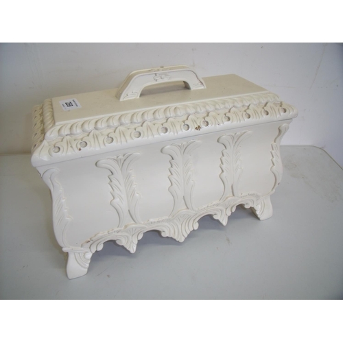 93 - Carved and cream painted rectangular table casket with lift off lid (34cm x 15cm x 23cm)