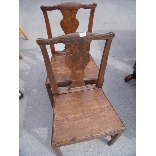 265 - Pair of early 19th C oak dining chairs with solid seats and H shaped under stretchers