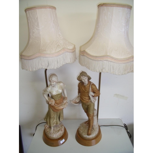 258 - Pair of Royal Dux table lamps in the form of a couple sowing seeds and harvesting, mounted on wooden... 