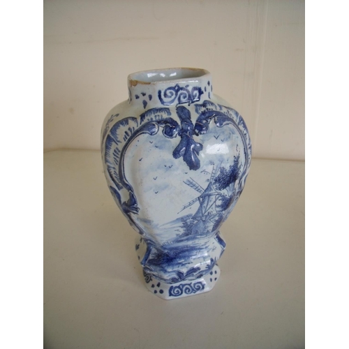 117 - Blue and white Delft ware vase depicting scene of a windmill with blue painted mark to the base VV (... 