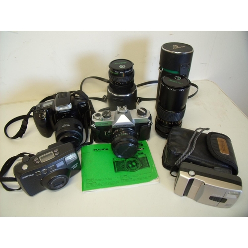 15 - Box of various cameras including a Pentax Espio 140, Canon Sprint, Minolta 300si etc