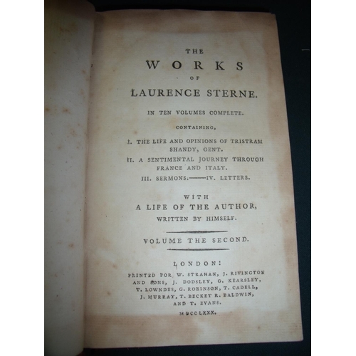 234 - Ten volumes of 'The Works of Laurence Sterne', all in leather bound covers in need of restoration