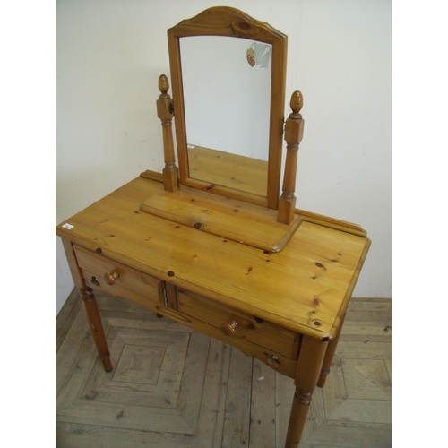 284 - Pine two drawer dressing table on turned supports with free standing mirror (width 95cm)