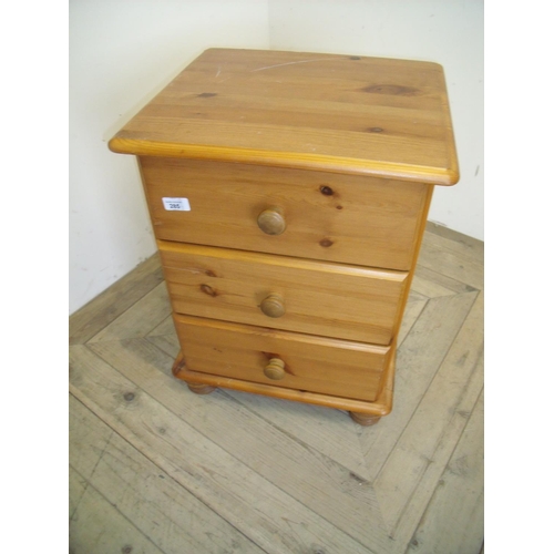 285 - Pine three drawer bedside chest