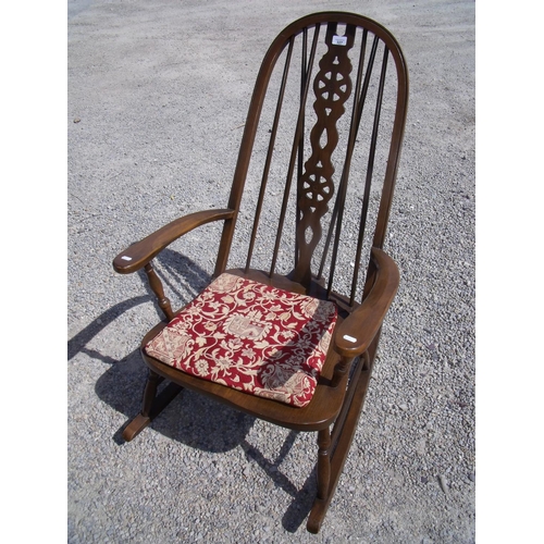 327 - Ercol style stick back oak rocking chair