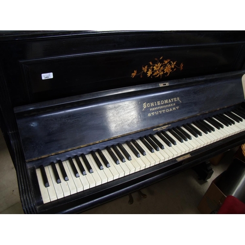 340 - Ebonised upright piano by Schiedmayer, retailed by Archibald Ramsden