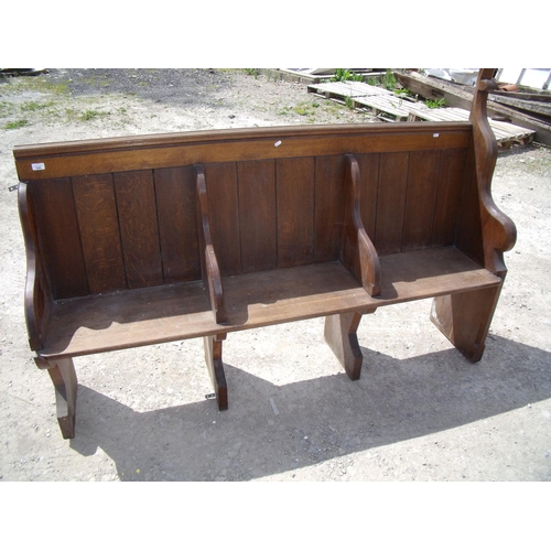 343 - Oak church pew with half Fleur de Lis finials (width 177cm)