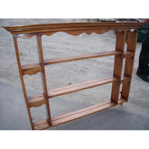 347 - Stained pine three tier wall shelf (width 132cm)