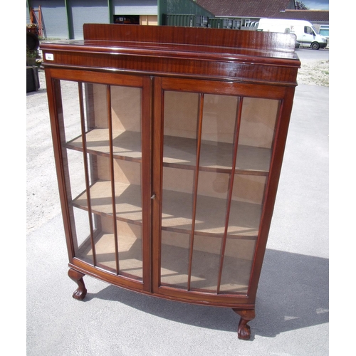 354 - Early - mid 20th C mahogany bow front display cabinet enclosed by two glazed doors, on ball and claw... 