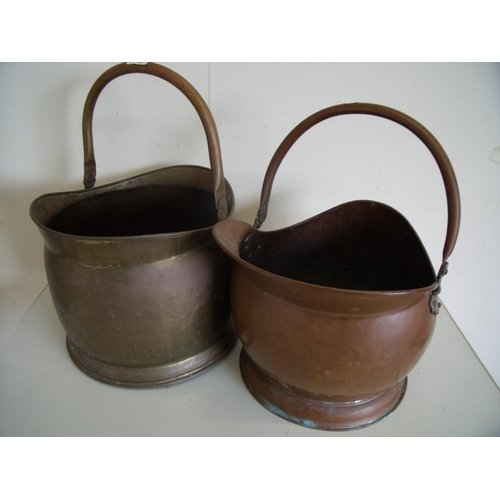 47 - One brass and one copper coal helmet with swing handles (2)