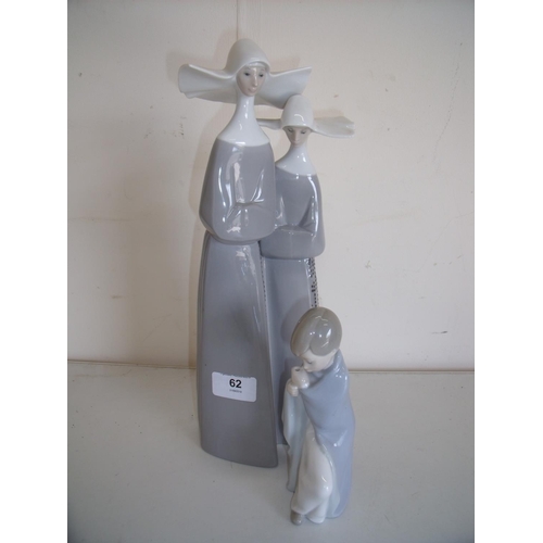 62 - Lladro figure of two nuns and another of a kneeling boy (2)