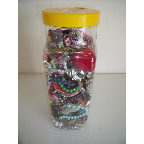 71 - Tub containing a large selection of various assorted costume jewellery