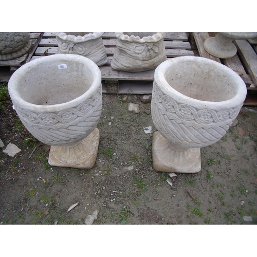 100 - Two Mayan urn circular planter decorated with Aztec designs