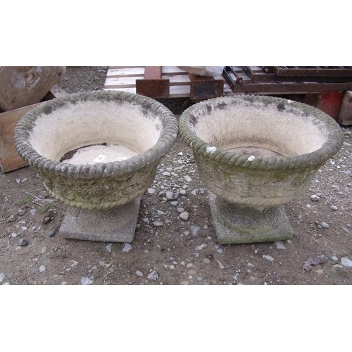 110 - Two stone garden urns