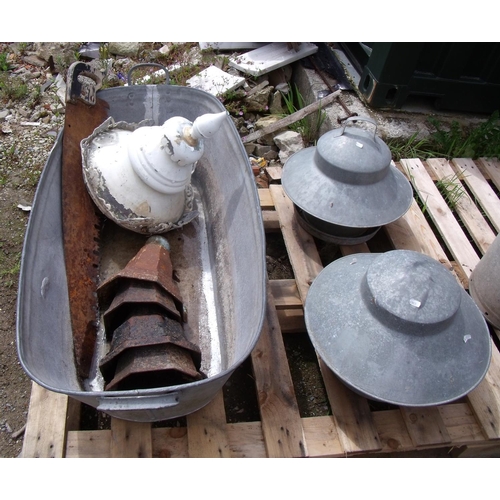 113 - Galvanized bath, vintage saw, four gutter drain pipe toppers, two galvanized bird feeders and a meta... 