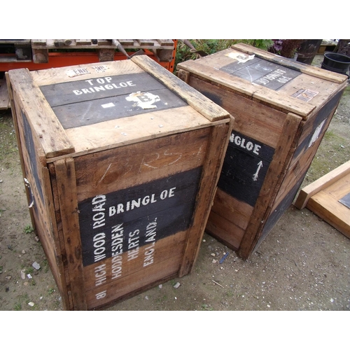 130 - Two wooden shipping crates with logos and labels