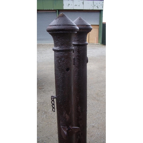 153 - Two large cast iron gate posts