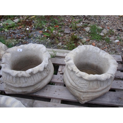 99 - Two large sack shaped planters