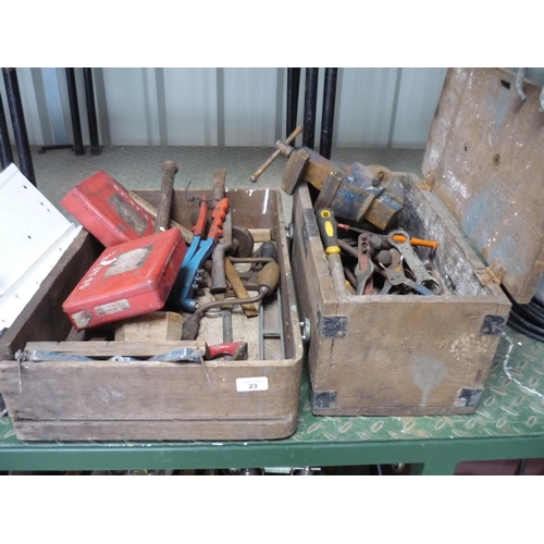 23 - Tool boxes containing a large amount of tools in various conditions, hand drills, spanners and vice.